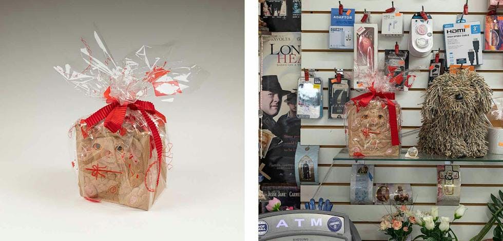 Image caption: Adam Milner, "Bag in Bag", 2019-2021, ceramic, screenprint on thrifted cellophane, ribbon. Exhibited at SSS DVD Video Corp, Queens, NY.